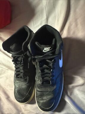 Nike Men’s Black High-Top Sneakers with White Swoosh